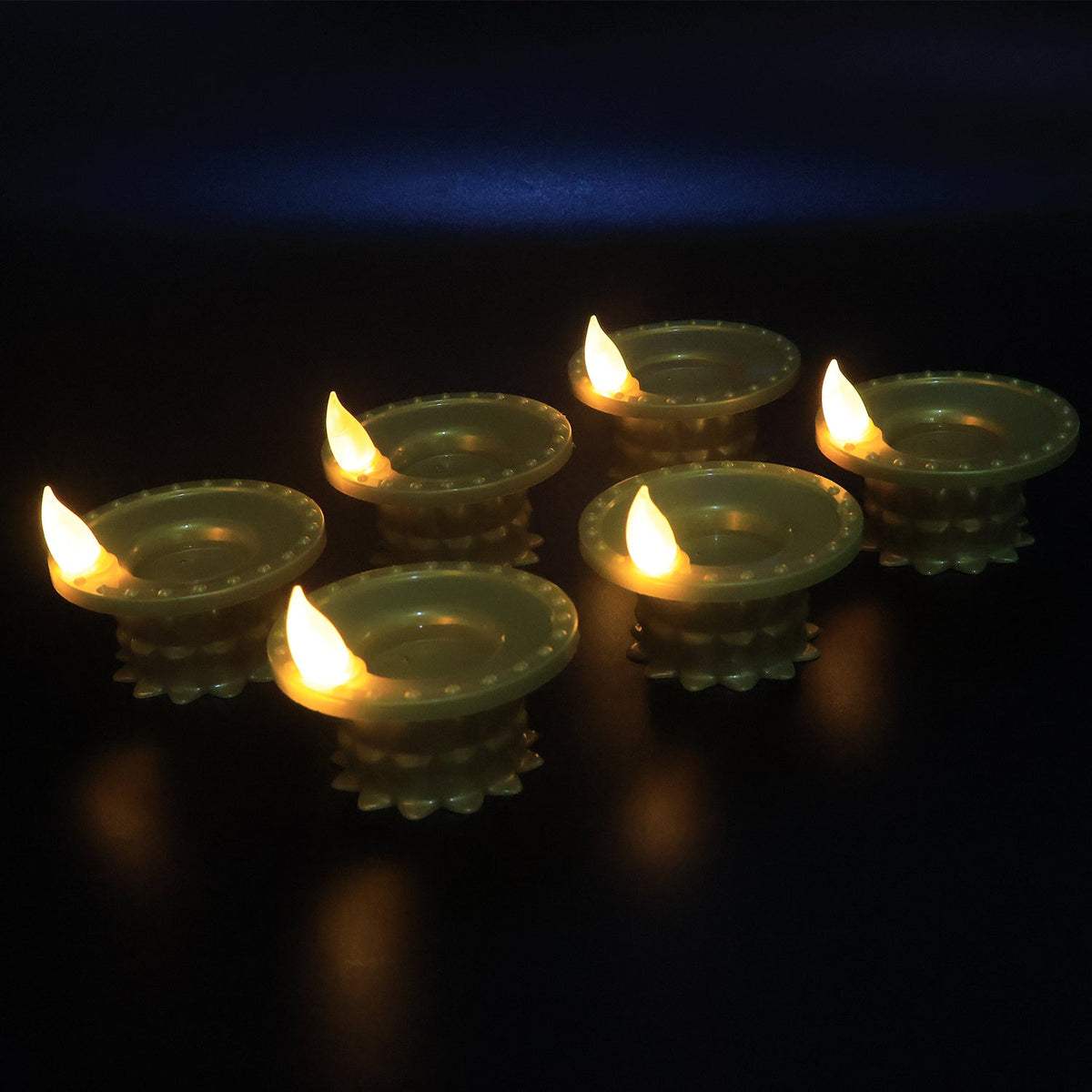 Golden LED diyas lit up