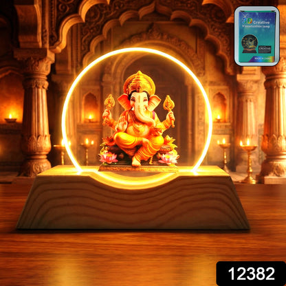 Ganesha lamp lit with a golden glow
