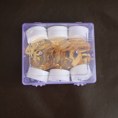 Golden diya LED tealights lit on a table