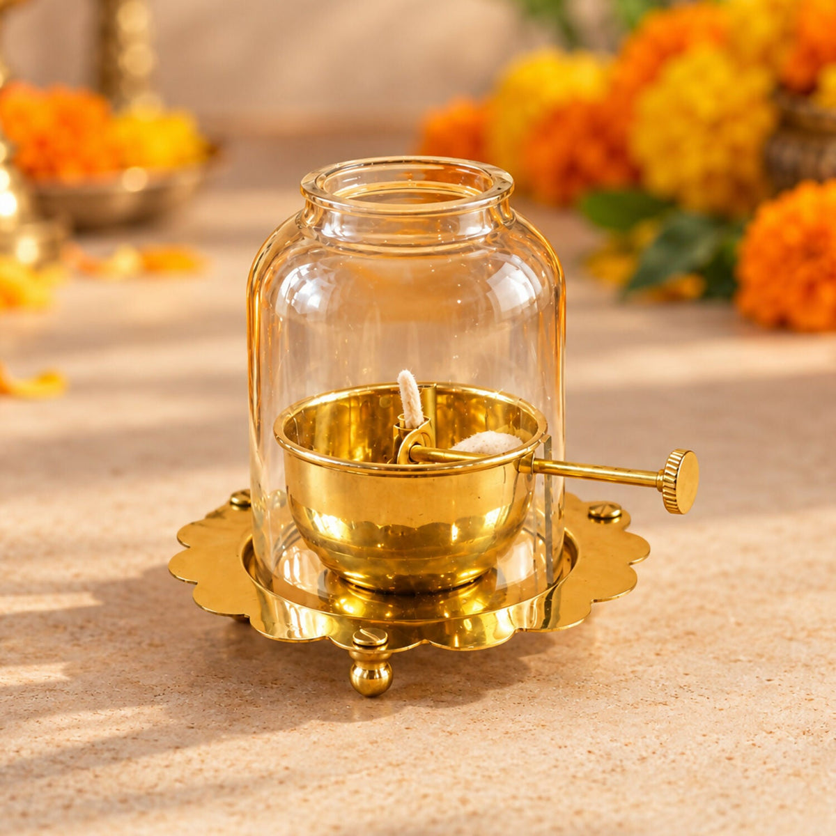 Brass akhand diya on a mandir shelf